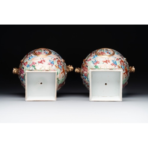 198 - A rare pair of Chinese Canton famille rose export urns, 19th C.H.: 33 cmThe absence of a condition r... 