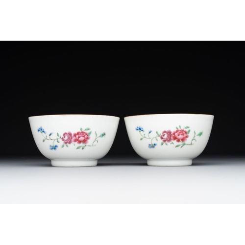 218 - A pair of Chinese armorial famille rose cups and saucers with the arms of Tyndall for the English ma... 