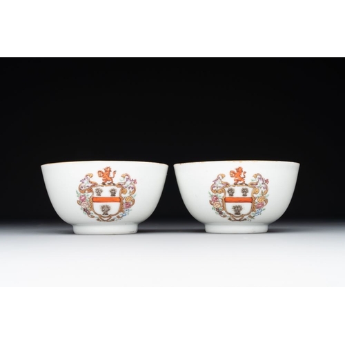 218 - A pair of Chinese armorial famille rose cups and saucers with the arms of Tyndall for the English ma... 