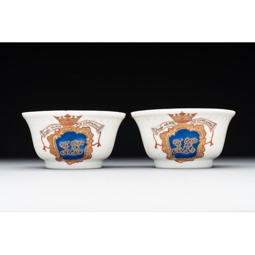 218 - A pair of Chinese armorial famille rose cups and saucers with the arms of Tyndall for the English ma... 