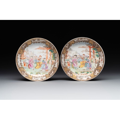 236 - A Chinese Canton famille rose 'mandarin subject' covered teapot and a pair of saucers, QianlongL.: 1... 