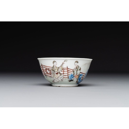 258 - A Chinese famille rose cup and saucer with music making ladies, Yongzheng/QianlongDia.: 12 cm (the s... 