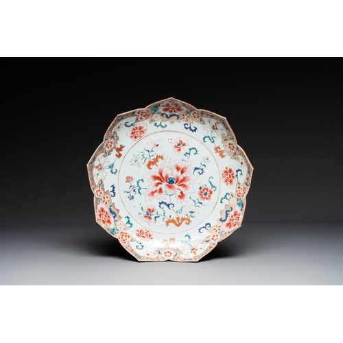 293 - A Chinese famille rose lotus-shaped dish and two plates, QianlongDia.: 33,7 cm Dia.: 23 cm The absen... 