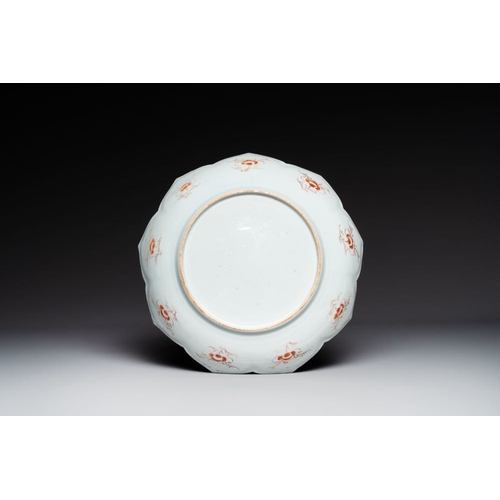 293 - A Chinese famille rose lotus-shaped dish and two plates, QianlongDia.: 33,7 cm Dia.: 23 cm The absen... 