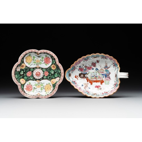 303 - A Chinese famille rose black-ground teapot with cover and stand and a sauceboat, QianlongDim.: 19,6 ... 