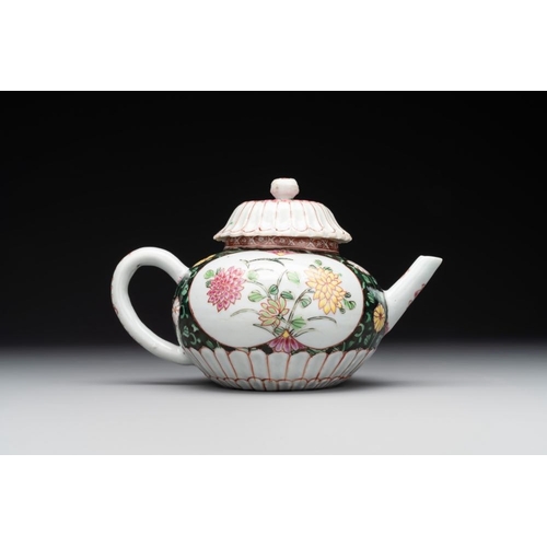 303 - A Chinese famille rose black-ground teapot with cover and stand and a sauceboat, QianlongDim.: 19,6 ... 