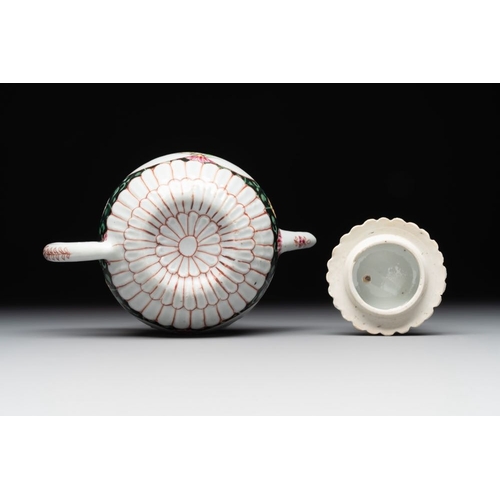 303 - A Chinese famille rose black-ground teapot with cover and stand and a sauceboat, QianlongDim.: 19,6 ... 