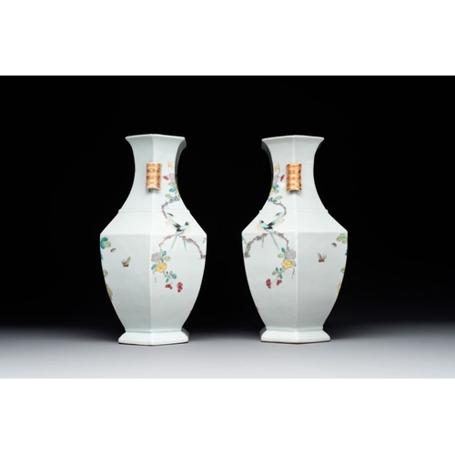 308 - A pair of hexagonal Chinese famille rose 'hu' vases with floral design, Qianlong/JiaqingH.: 34,6 cmT... 