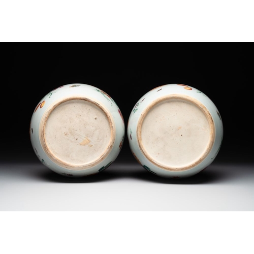 327 - A pair of fine Chinese famille rose 'botanical Merian-style' jars with wooden covers, QianlongH.: 22... 