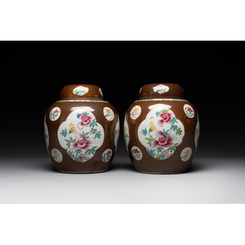 328 - A pair of Chinese capucin-brown-ground famille rose covered jars with floral design, Yongzheng/Qianl... 