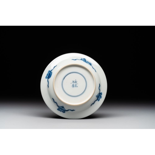 347 - A Chinese blue and white 'erotic' cup and saucer, KangxiDia.: 11 cm (the saucer)Dia.: 6,8 cm - H.: 4... 