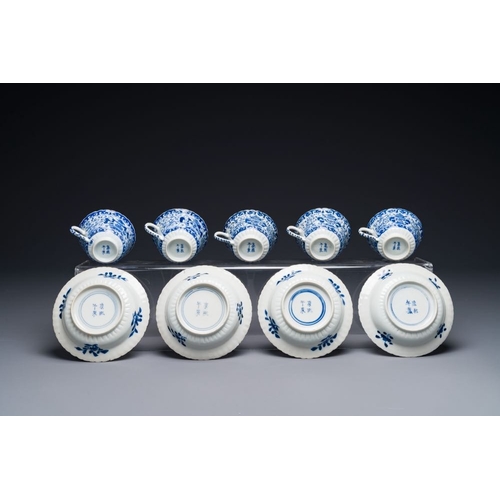 352 - Five Chinese blue and white cups and four saucers with boys carrying a vase, Kangxi mark, GuangxuDia... 