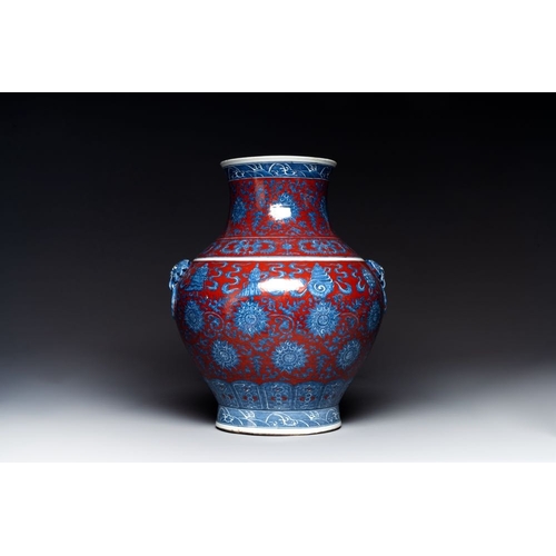 354 - A Chinese blue and white, and iron-red 'bajixiang' 'hu' vase on wooden stand, Qianlong mark, 19th C.... 