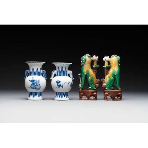 365 - A pair of Chinese blue and white vases, a pair of sancai Buddhist lions, a famille rose ewer and a t... 