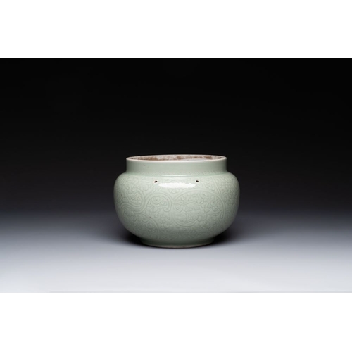 377 - A Chinese monochrome celadon-glazed jar with anhua chilong and floral design, KangxiH.: 16,3 cmThe a... 