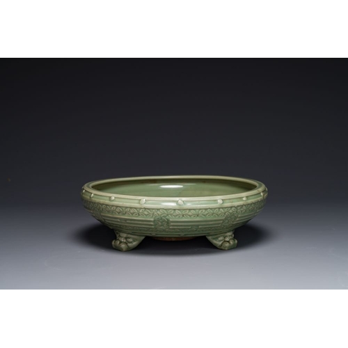 384 - A large Chinese Longquan celadon 'trigrams' censer on wooden stand, MingDia.: 36 cm - H.: 11 cm (the... 