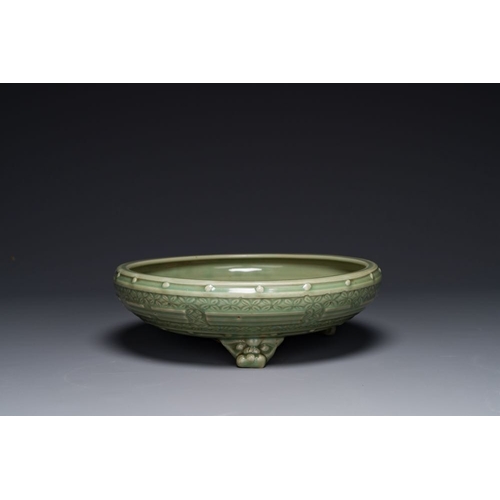 384 - A large Chinese Longquan celadon 'trigrams' censer on wooden stand, MingDia.: 36 cm - H.: 11 cm (the... 