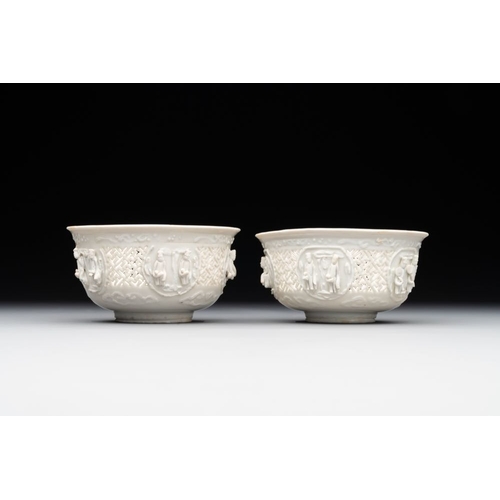 392 - A pair of rare Chinese reticulated white-glazed biscuit 'Eight Immortals and Shoulao' bowls, WanliDi... 