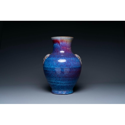 403 - A large Chinese flambe glaze 'hu' vase with Taotie handles, QingH.: 53 cm
  The absence of a conditi... 