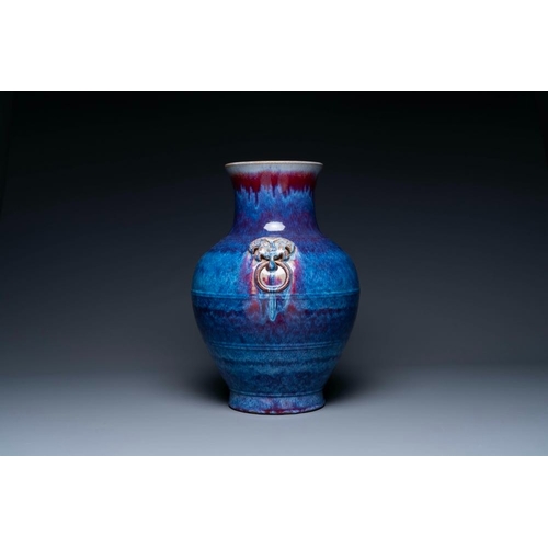 403 - A large Chinese flambe glaze 'hu' vase with Taotie handles, QingH.: 53 cm
  The absence of a conditi... 