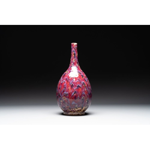 405 - A Chinese flambe-glazed bottle vase, 19th C.H.: 44 cmThe absence of a condition report does not impl... 