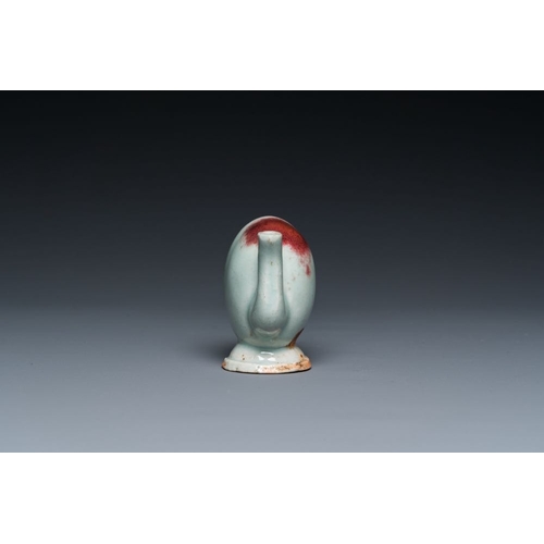 412 - A Chinese miniature peach-shaped Jun-type 'Cadogan' ewer, QianlongL.: 8 cm - H.: 6 cm
 The name 'Cad... 