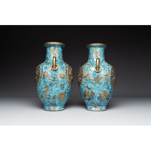 414 - A pair of Chinese robin's egg and faux bronze-glazed 'hu' vases, Qianlong mark, 19th C.H.: 37,8 cmTh... 