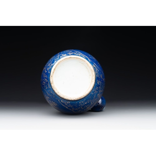 416 - A Chinese gilt-decorated powder-blue kendi with floral design, KangxiH.: 24 cmThe absence of a condi... 