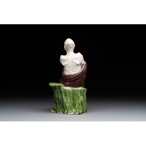 422 - A fine Chinese sancai-glazed figure of a Luohan, QianlongH.: 24,5 cmThe absence of a condition repor... 