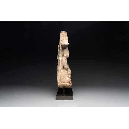 456 - A Burmese limestone stele with Buddha and two attendants with traces of gilding, 19th C.H.: 58 cm (i... 