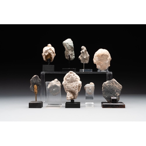 469 - A collection of 9 Gandhara grey schist and stucco fragments of Buddha and divinities, 1/2nd C.H.: 14... 