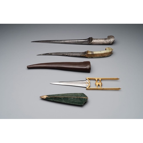 484 - A collection of three daggers decorated with jade, silver and gold and an Indian mogul sword, India,... 