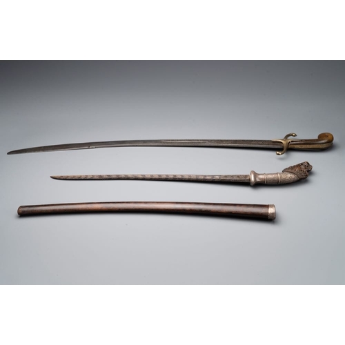 486 - A silver plated dagger and four swords, China, Burma and Indonesia, 18/19th C.L.: 94 cm (the longest... 