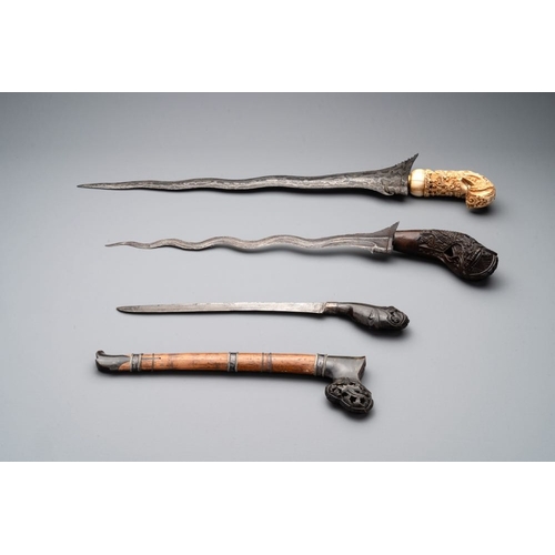 488 - A collection of six krises with carved handles, four with scabbard, Indonesia, 19th C.L.: 67 cm (the... 