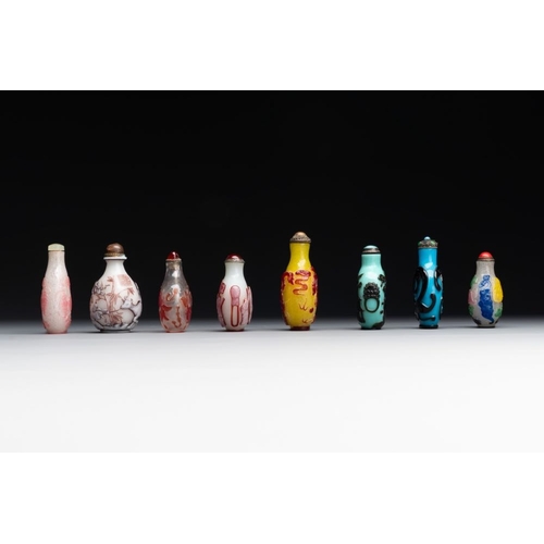 491 - Eight Chinese Peking glass snuff bottles, Qianlong mark, 19/20th C.H.: 8 cm (the tallest incl. stopp... 