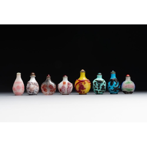 491 - Eight Chinese Peking glass snuff bottles, Qianlong mark, 19/20th C.H.: 8 cm (the tallest incl. stopp... 