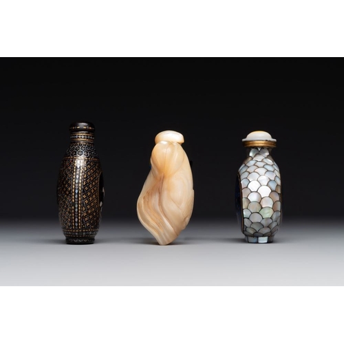 502 - Two Chinese lacquered and mother-of-pearl-inlaid snuff bottles and a carved mother-of-pearl shell sn... 