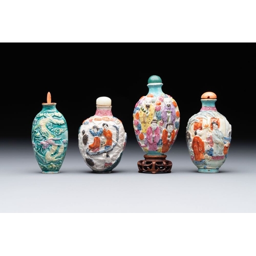 511 - Eight Chinese moulded famille rose snuff bottles, Qianlong mark, 19th C.H.: 10,5 cm (the tallest inc... 