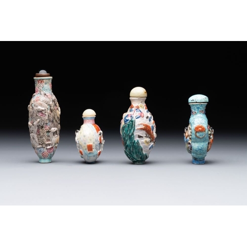 511 - Eight Chinese moulded famille rose snuff bottles, Qianlong mark, 19th C.H.: 10,5 cm (the tallest inc... 