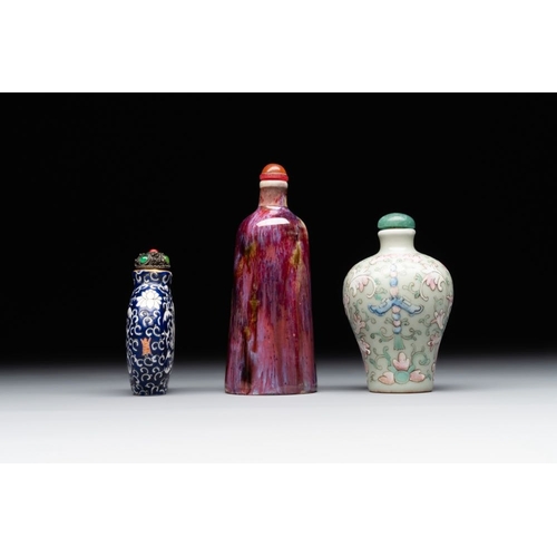 517 - Two Chinese famille rose 'lotus scroll' snuff bottles and a flambe-glazed snuff bottle, 19th C.H.: 1... 