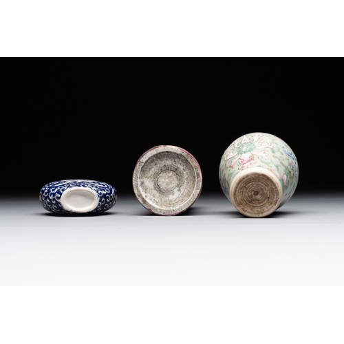 517 - Two Chinese famille rose 'lotus scroll' snuff bottles and a flambe-glazed snuff bottle, 19th C.H.: 1... 