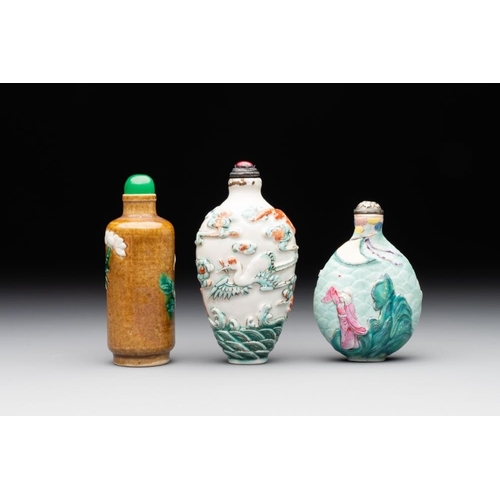 518 - Three Chinese famille rose moulded snuff bottle, Ying Chuan Zhen Cang mark, 19th C.H.: 8,8 cm (the t... 