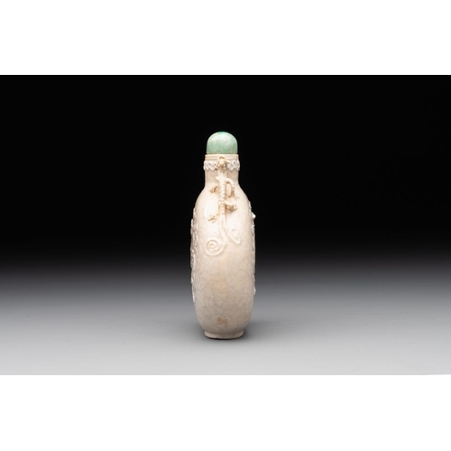 542 - A rare Chinese monochrome ge-type 'chilong' snuff bottle with jadeite stopper, Qianlong mark and of ... 