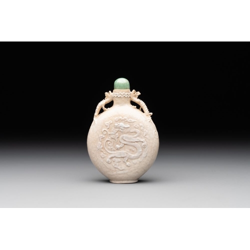 542 - A rare Chinese monochrome ge-type 'chilong' snuff bottle with jadeite stopper, Qianlong mark and of ... 