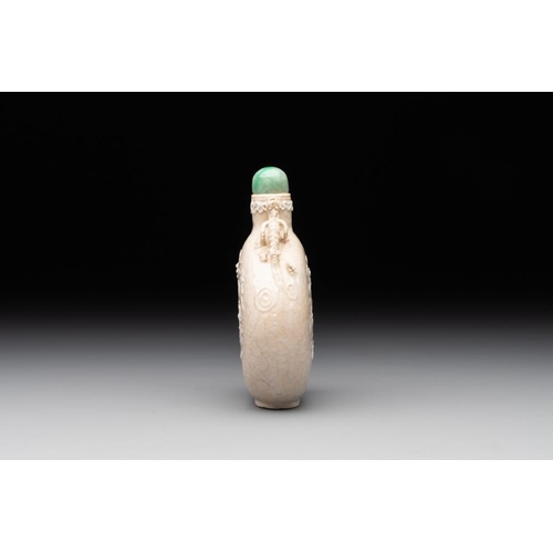 542 - A rare Chinese monochrome ge-type 'chilong' snuff bottle with jadeite stopper, Qianlong mark and of ... 