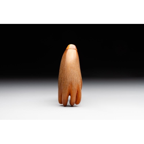 547 - A rare Chinese rhinoceros horn snuff bottle in the shape of a Buddha hand, 19th C.Please note this l... 