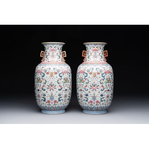 733 - A pair of Chinese famille rose vases with floral design, Jiaqing mark, 19/20th C.H.: 28 cmThe absenc... 