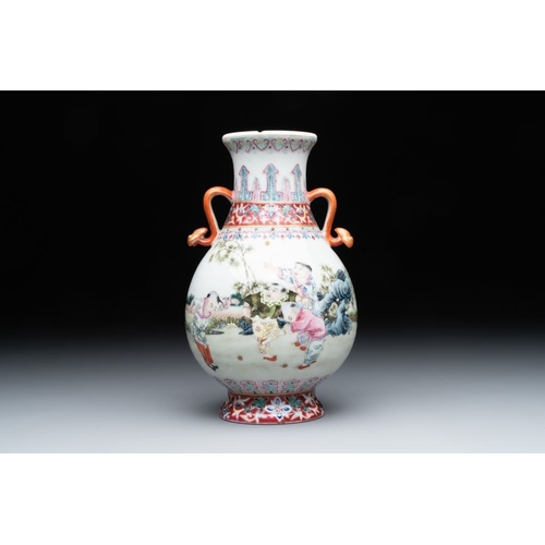 734 - A Chinese famille rose 'hu' vase with playing boys, Qianlong mark, 20th C.H.: 19,5 cm
 Provenance: A... 