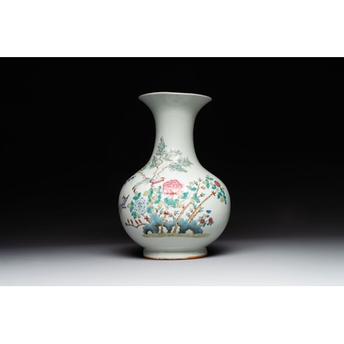 736 - A Chinese famille rose vase with birds among blossoming branches, RepublicH.: 34,5 cmThe absence of ... 