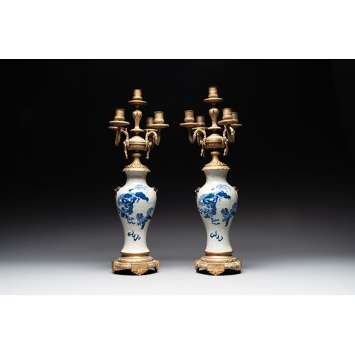 763 - A pair of Chinese blue and white Nanking crackle-glazed vases with gilt bronze candelabra mounts, 19... 